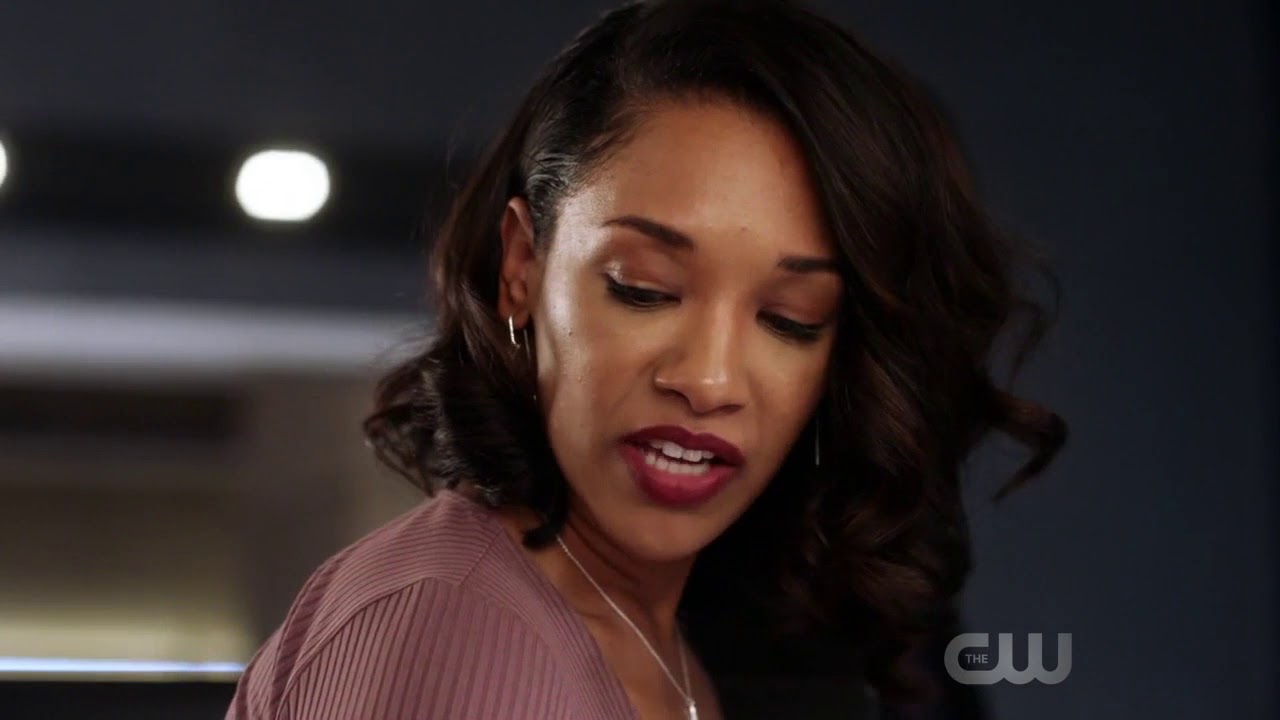 Candice Patton, peeling off shrunk colleague off her boot, from the Flash