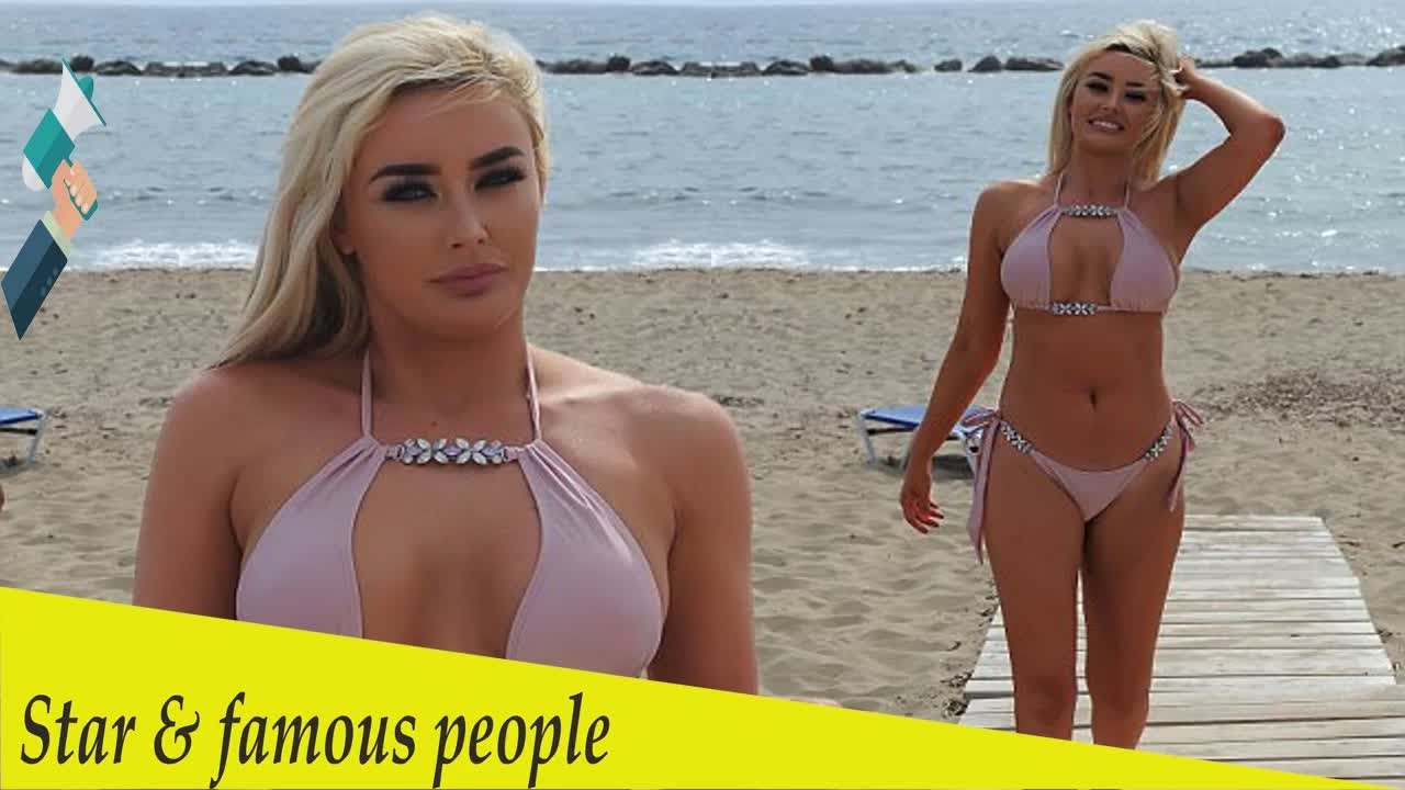 Chloe Crowhurst parades her cleavage in a pink bikini
