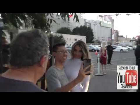 Emily Sears greets fans arriving to the Maxim Hot 100 Party at Hollywood Palladium in Hollywood