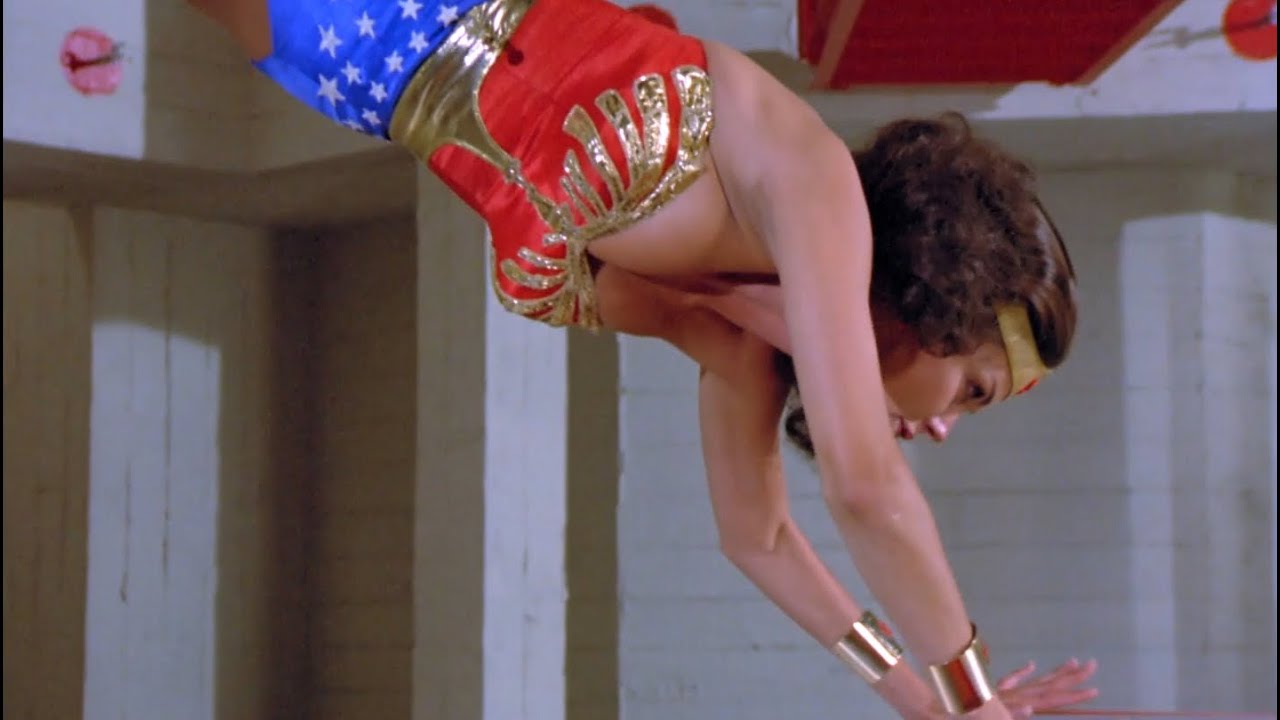 An Extremely Sexy Wonder Woman Hanging Upside Down Opening Safe 1080P BD