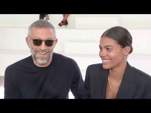 Newly wed Vincent Cassel and Tina Kunakey front row for the Roberto Cavalli Show