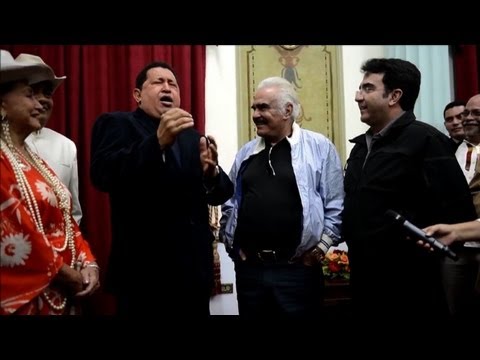 Hugo Chavez sings with famous Mexican musician