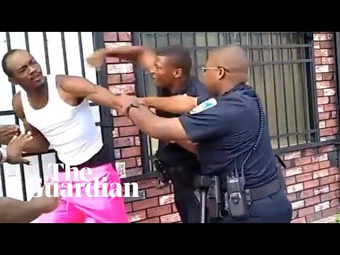 Baltimore police officer resigns after being filmed beating man