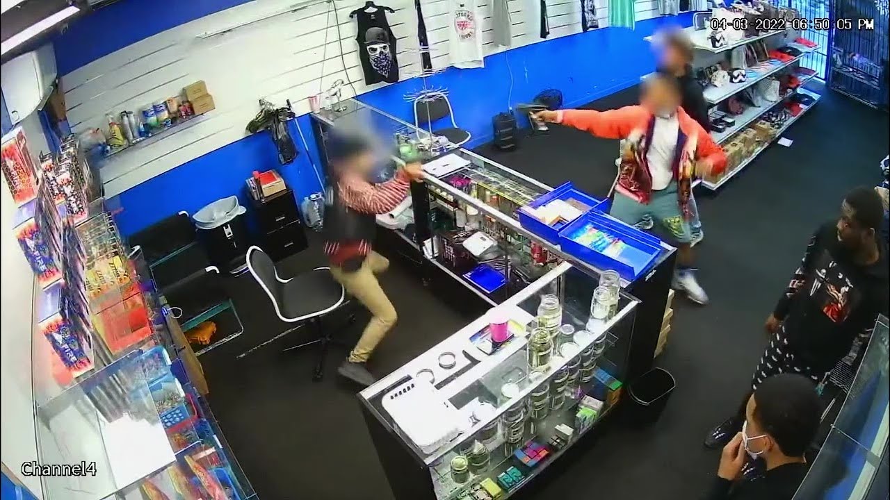 Gun battle breaks out between store employee and would-be robbers