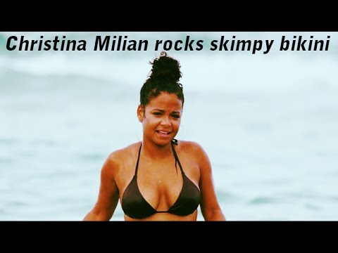 Christina Milian showcases her generous curves in bikini - Wardrobe malfunction