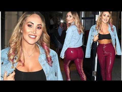 Lauryn Goodman slips envy-inducing curves into PVC lace-up trousers on lavish night out in London