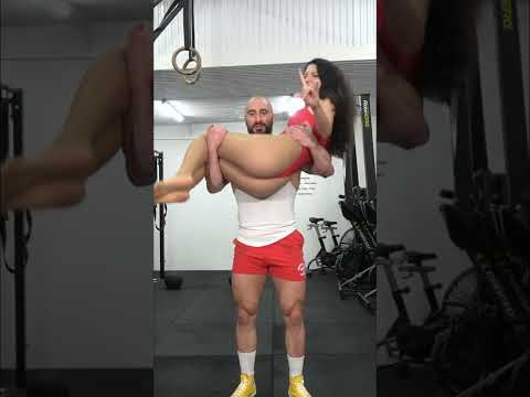 Bicep curling a woman