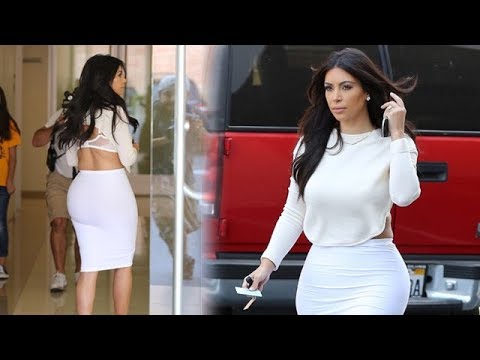 Kim Kardashian Is White Hot As She Squeezes Her Curves Into Skin-Tight Skirt [2014]