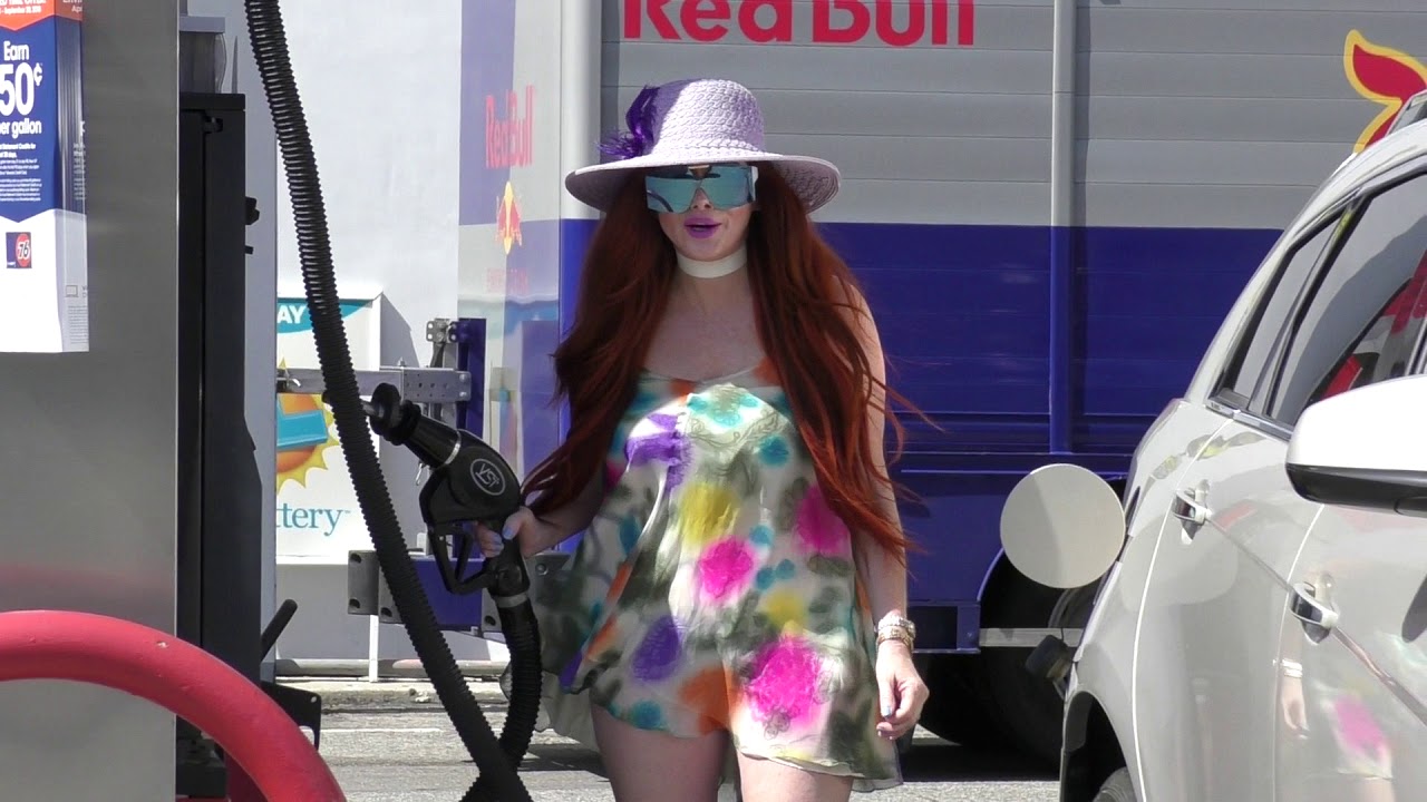 Phoebe Price turns pumping gas into Fashion Show - Subscribe
