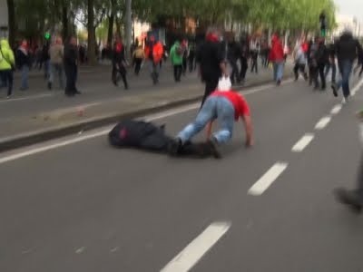 Raw: Protester Knocks Out Brussels Police Chief