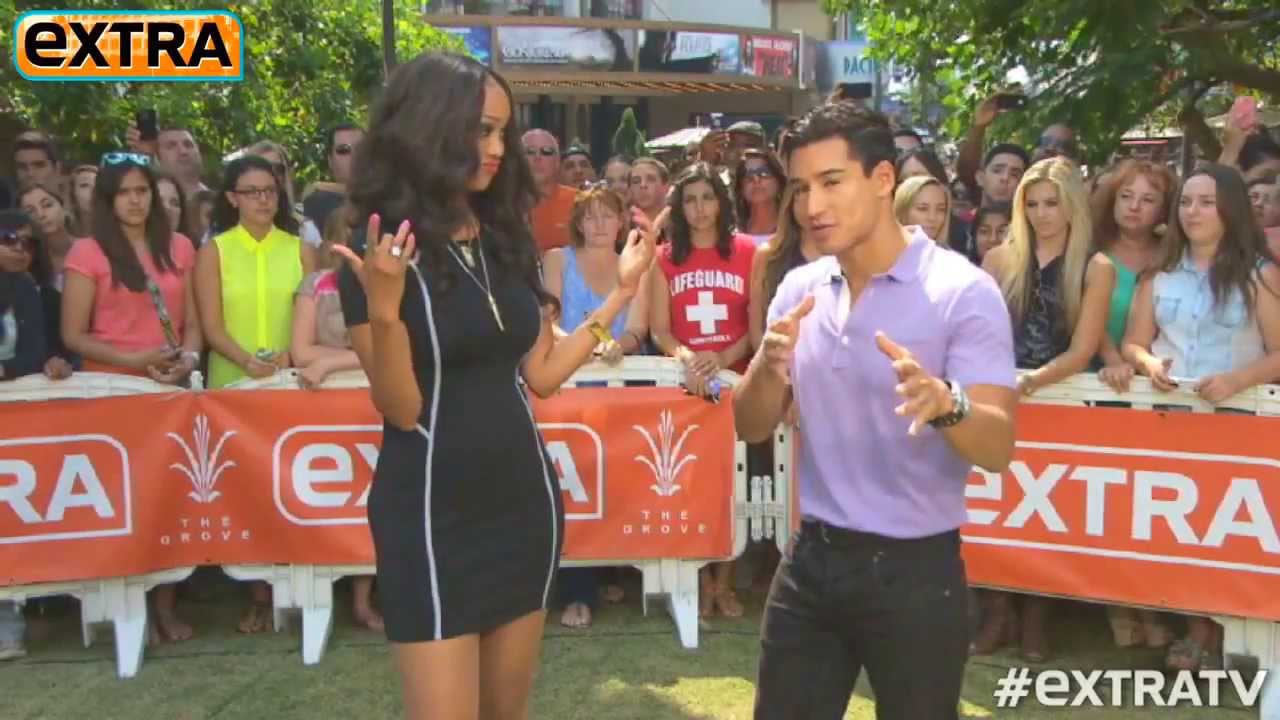 Tyra Banks shows Mario Lopez some hot dance moves.