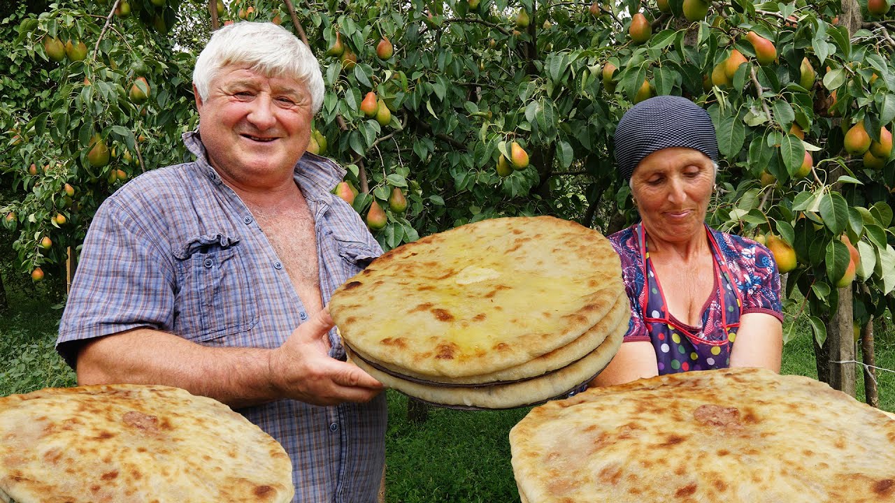 North OSSETIA village life. Grandmother cooks OSSETIAN PIES.