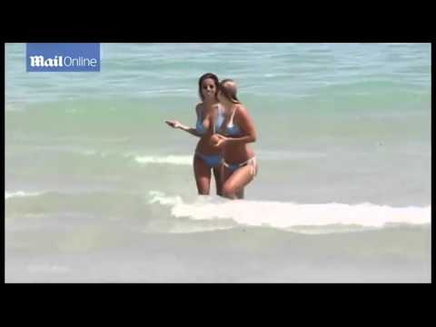 Natasha Oakley and Devin Brugman in blue bikinis in Miami