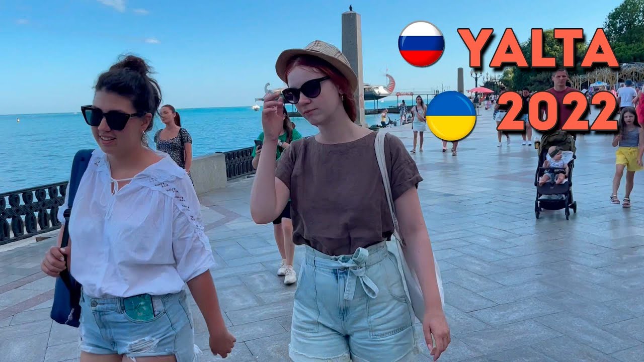 Yalta embankment street walk summer 2022. Crimea, Russia/Ukraine.