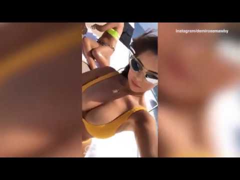 Demi Rose enjoys boat ride in tiny yellow bikini with gal pals.