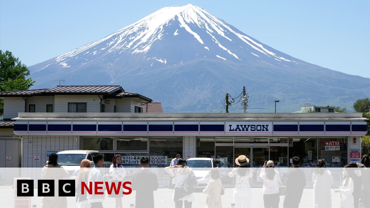 Japanese town blocks iconic Mount Fuji view to deter tourists 