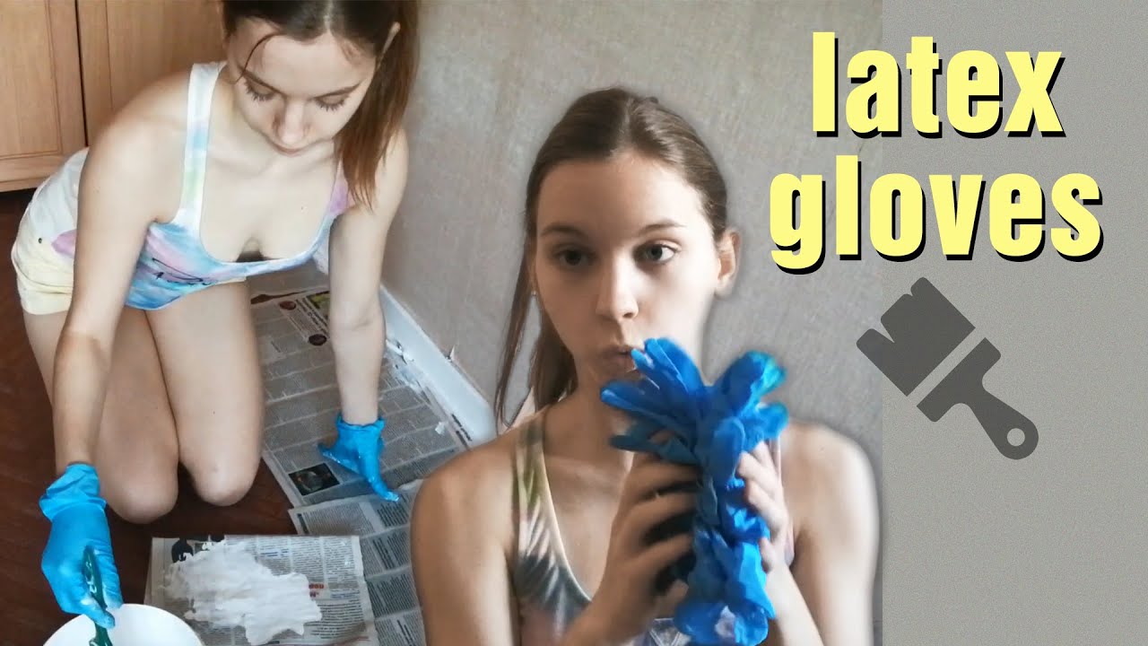 Julia Del Rey - Painting the baseboard in blue latex gloves
