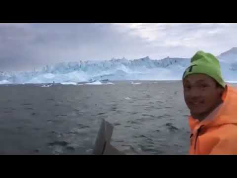 Small Boat Hauls Ass To Escape Iceberg Tsunami