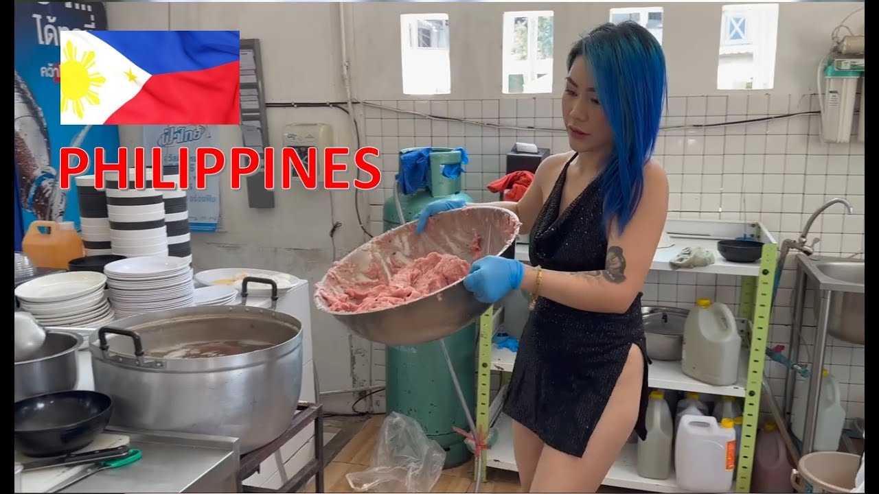 Beautiful Thailand Woman Cooking Chicken Noodles
