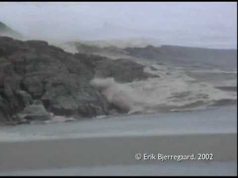 ılulissat, greenland - giant rolling ıceberg creates a tsunami like wave