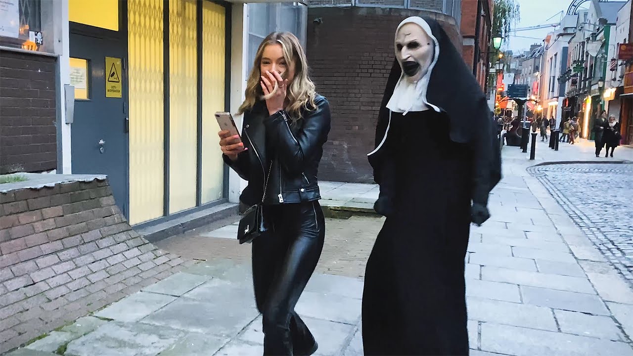 she has no ıdea what's  behind her. craziest reactions. the nun prank