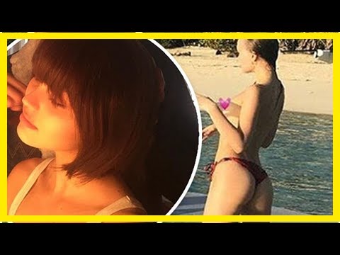 Lily rose depp goes topless in skimpy bikini bottoms