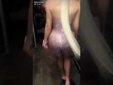 Kylie Jenner walking in tight dress