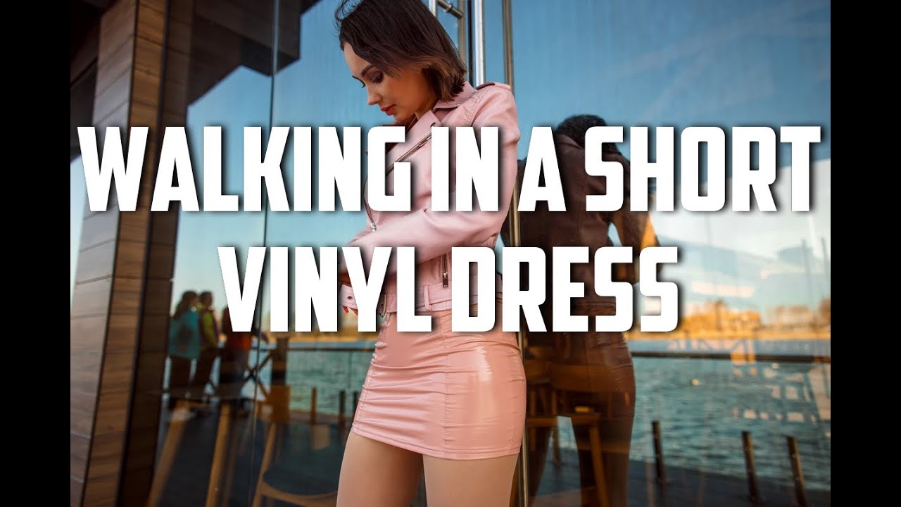 walking-in-high-heels-in-a-short-vinyl-dress