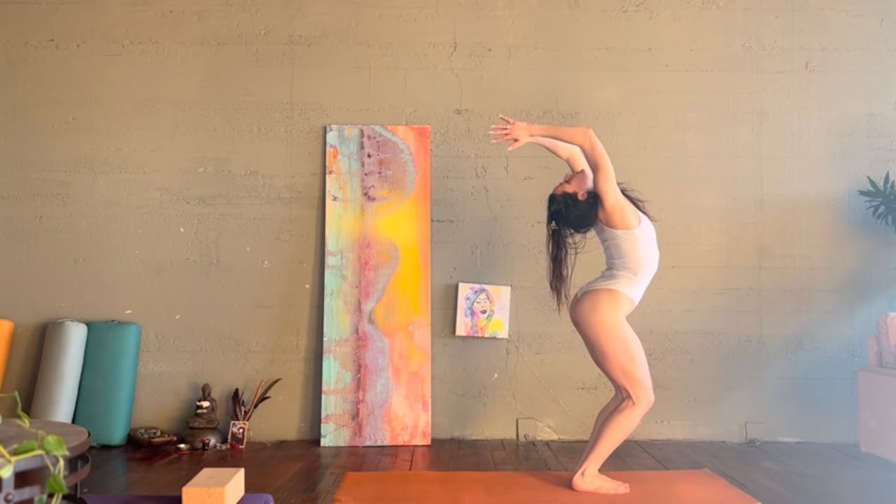 Vinyasa Yoga Practice Live at Sunset Studio in White Bodysuit