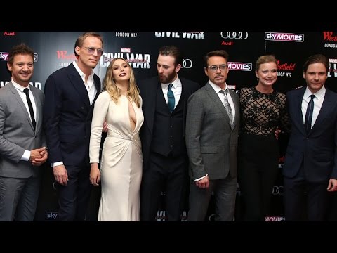 Chris Evans Can't Keep His Eyes Off Elizabeth Olsen's Chest at 'Captain America: Civil War' Premi…