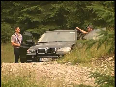 Gerard Butler & Madalina Ghenea with BMW X5