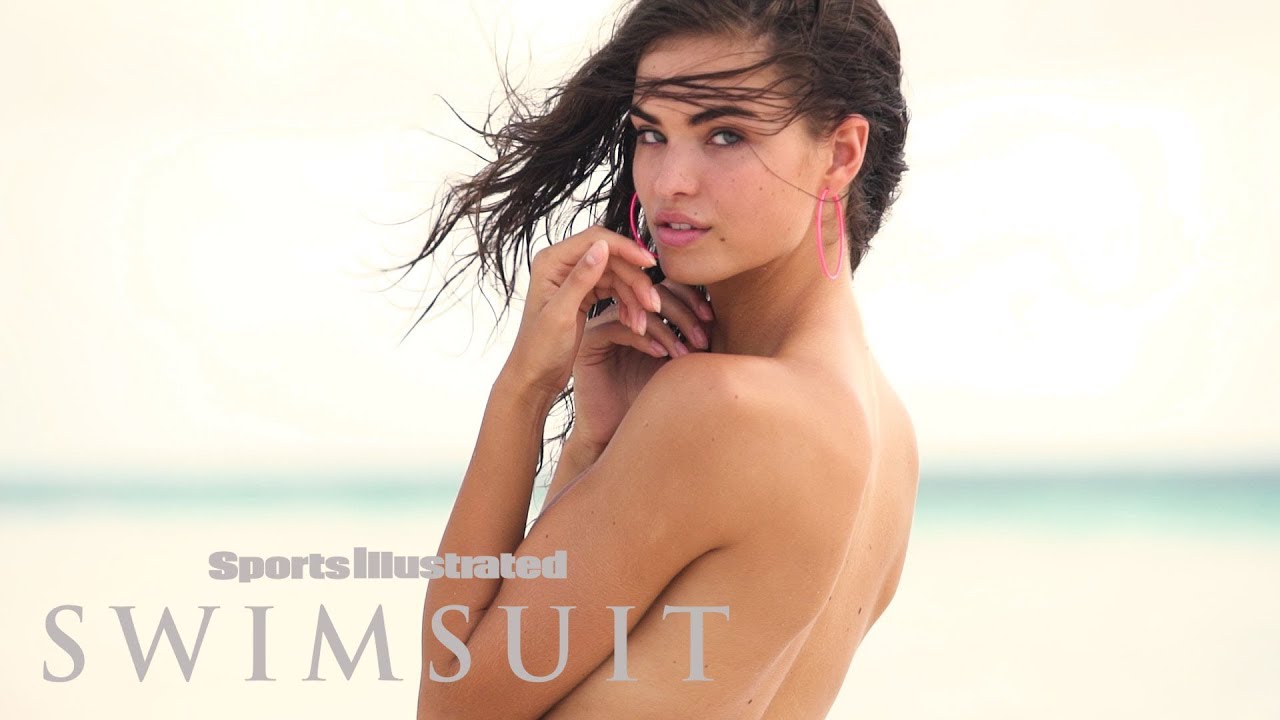 Robin Holzken Rolls Around in the Wet Sand | INTIMATES | Sports Illustrated Swimsuit