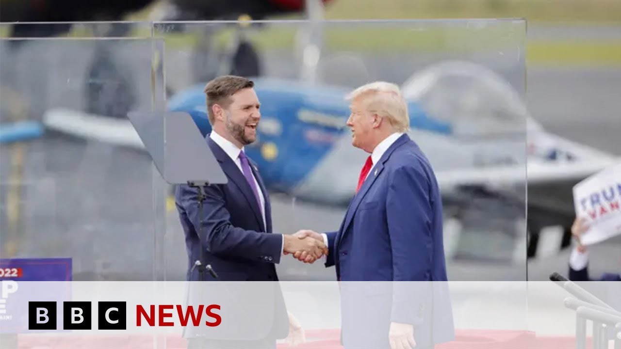 donald-trump-stands-behind-bullet-proof-glass-at-first-outdoor-rally-since-he-was-shot